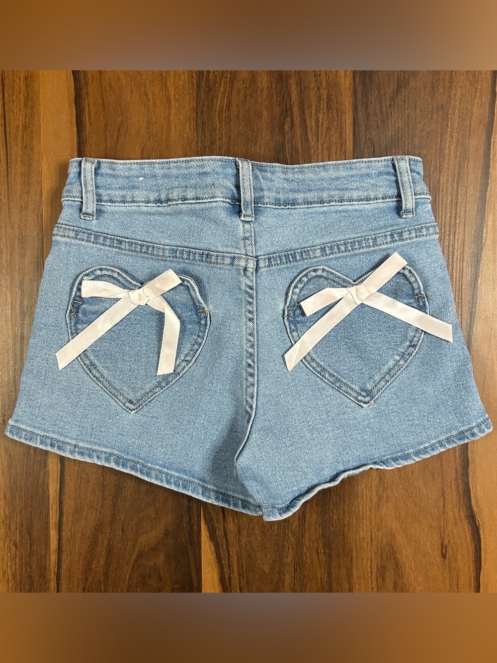 Heart-Pocket Light Blue Denim Shorts with Cream Ribbon Bows